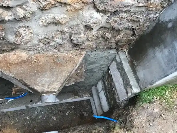 Étanchéité de mur enterré et drainage à Nanterre, photo 11 sur 13 : reprise fondation angle mortier ciment